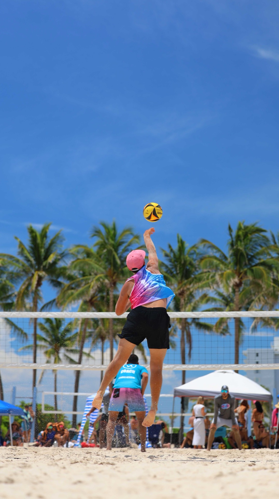 Brandon competing at the net in Miami Beach